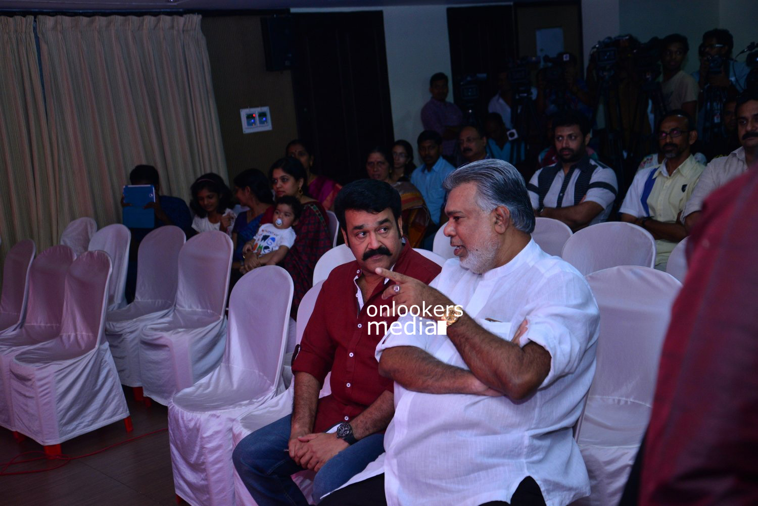 https://onlookersmedia.in/wp-content/uploads/2015/04/Lalila-O-Laila-Audio-Launch-Stills-Images-Mohanlal-Amala-Paul-Malayalam-Movie-2015-Onlookers-Media-118.jpg