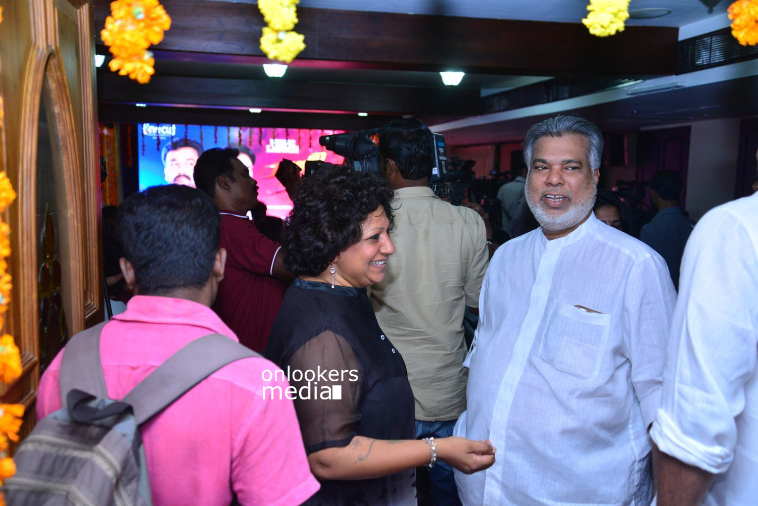 https://onlookersmedia.in/wp-content/uploads/2015/04/Lalila-O-Laila-Audio-Launch-Stills-Images-Mohanlal-Amala-Paul-Malayalam-Movie-2015-Onlookers-Media-122.jpg