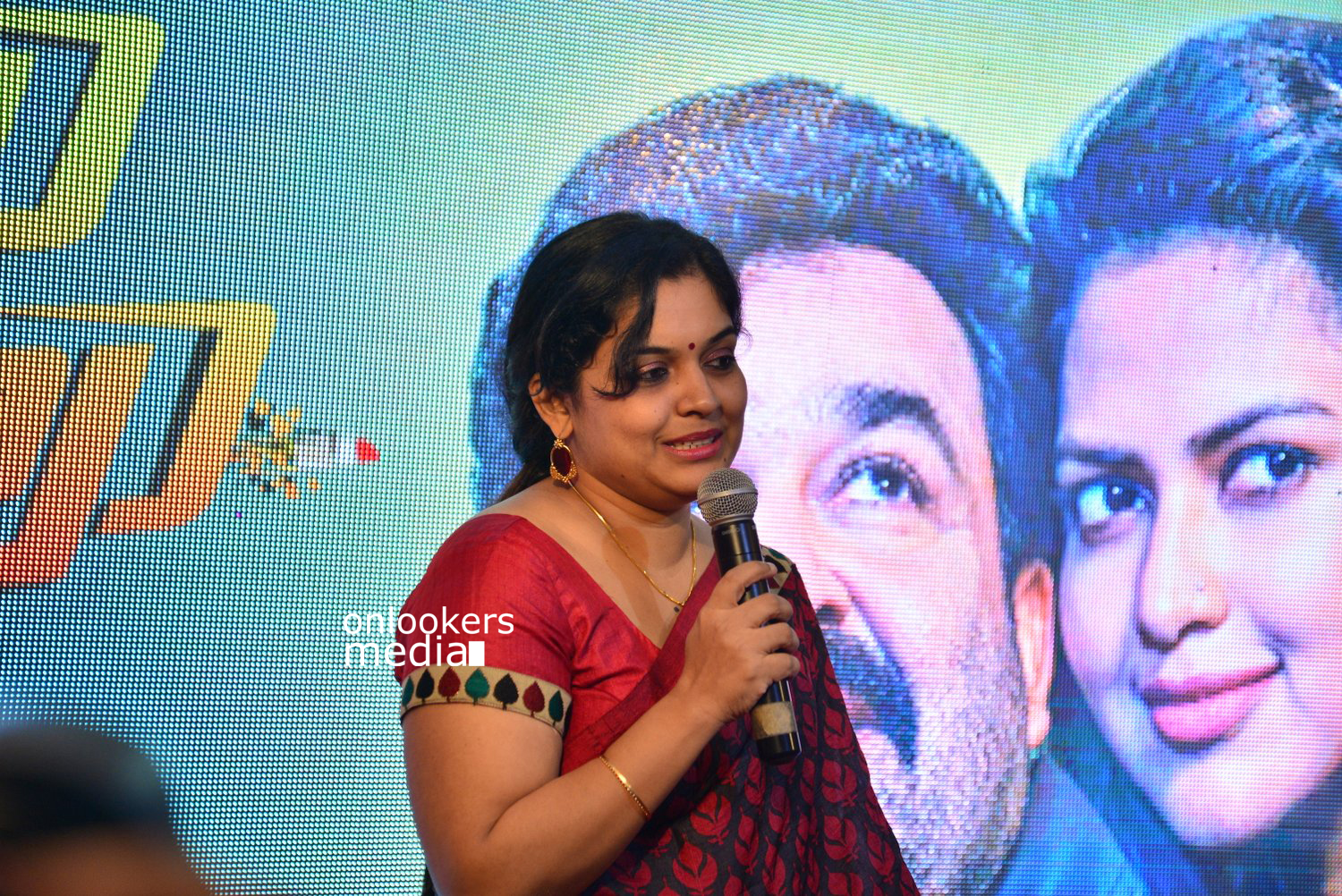 https://onlookersmedia.in/wp-content/uploads/2015/04/Lalila-O-Laila-Audio-Launch-Stills-Images-Mohanlal-Amala-Paul-Malayalam-Movie-2015-Onlookers-Media-2.jpg