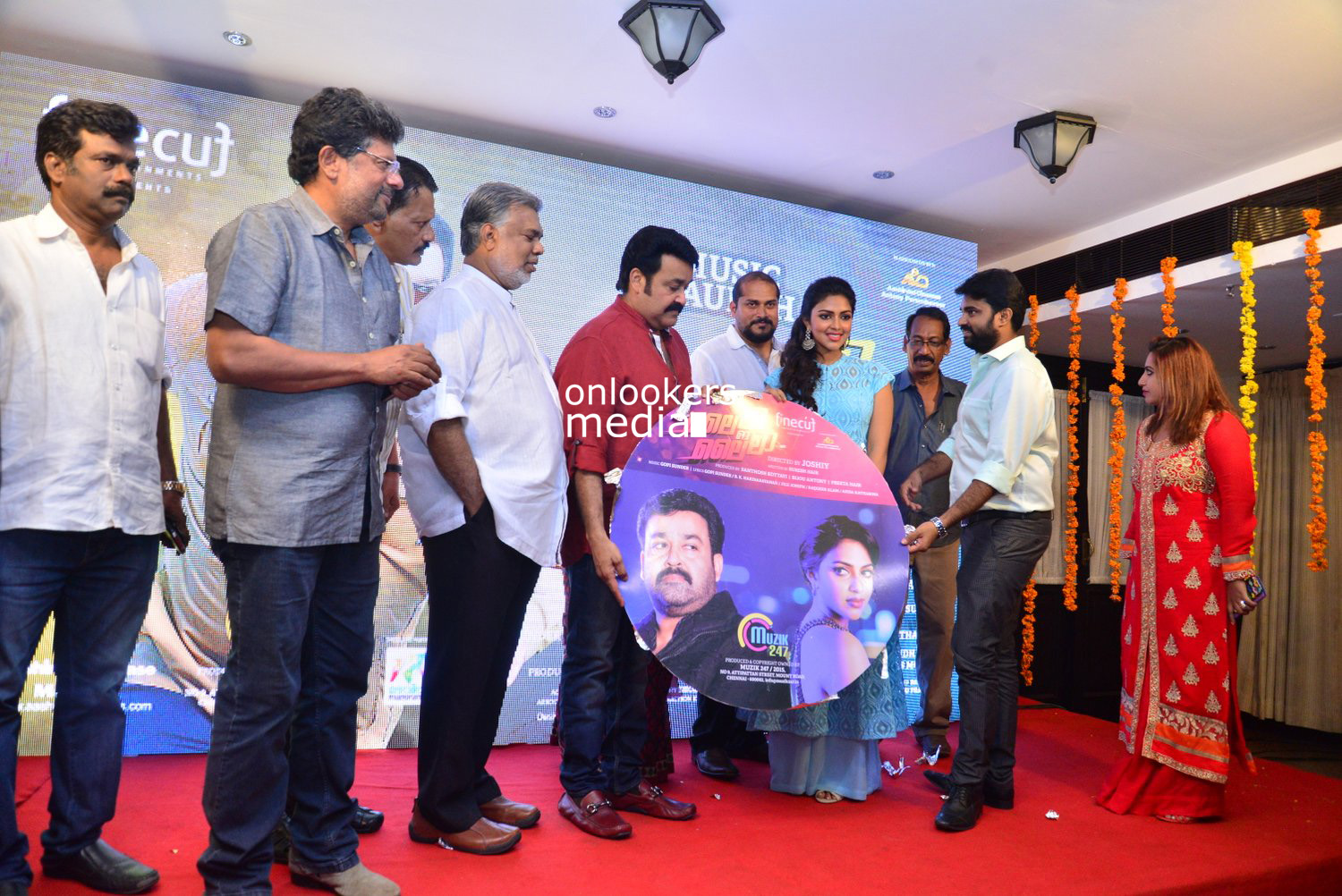 https://onlookersmedia.in/wp-content/uploads/2015/04/Lalila-O-Laila-Audio-Launch-Stills-Images-Mohanlal-Amala-Paul-Malayalam-Movie-2015-Onlookers-Media-64.jpg