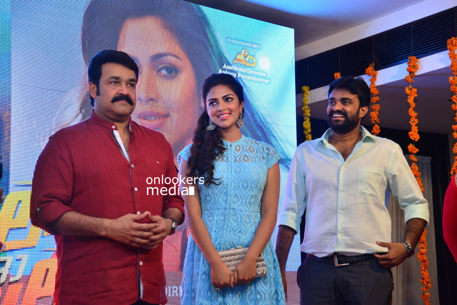 https://onlookersmedia.in/wp-content/uploads/2015/04/Lalila-O-Laila-Audio-Launch-Stills-Images-Mohanlal-Amala-Paul-Malayalam-Movie-2015-Onlookers-Media-74.jpg