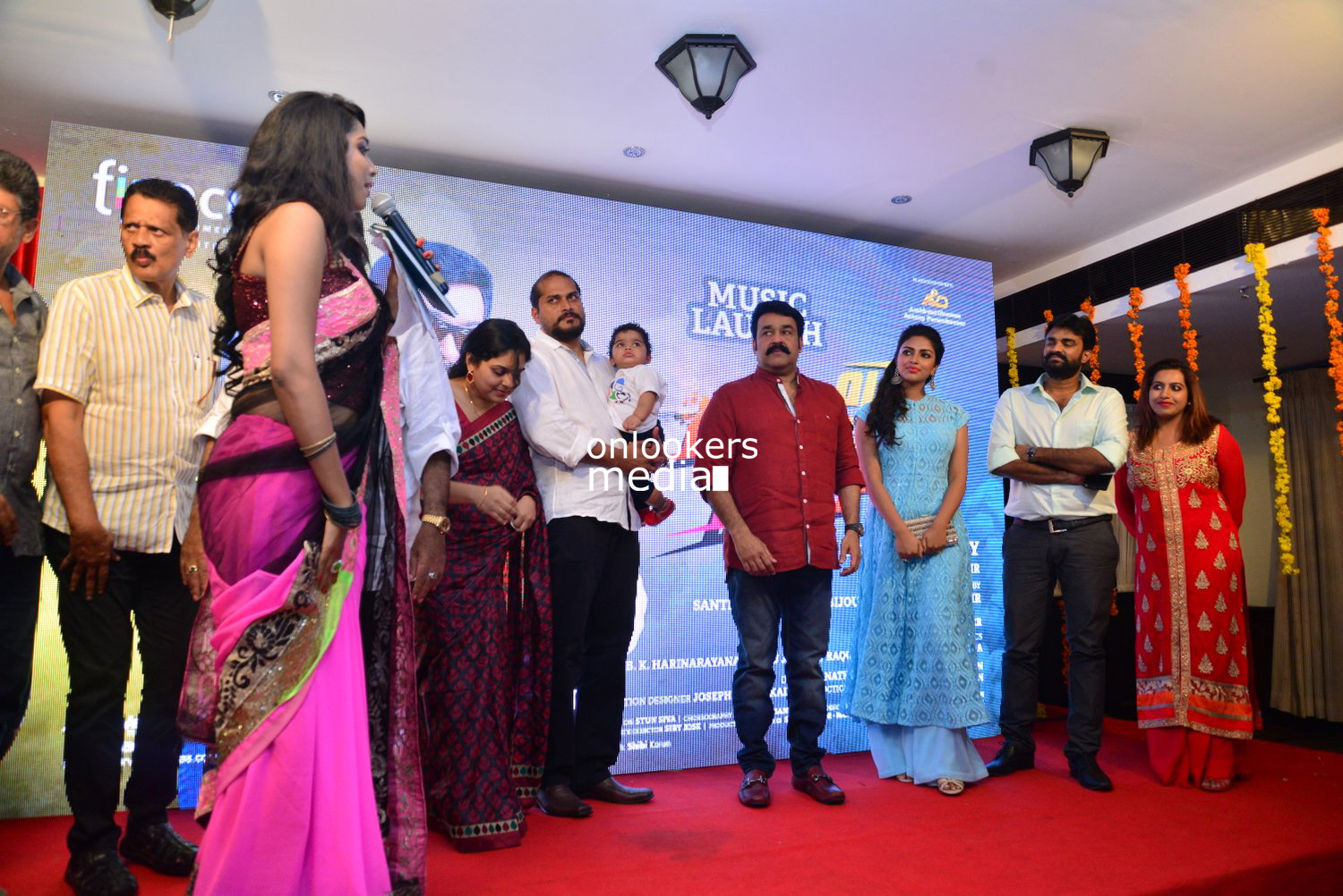 https://onlookersmedia.in/wp-content/uploads/2015/04/Lalila-O-Laila-Audio-Launch-Stills-Images-Mohanlal-Amala-Paul-Malayalam-Movie-2015-Onlookers-Media-76.jpg