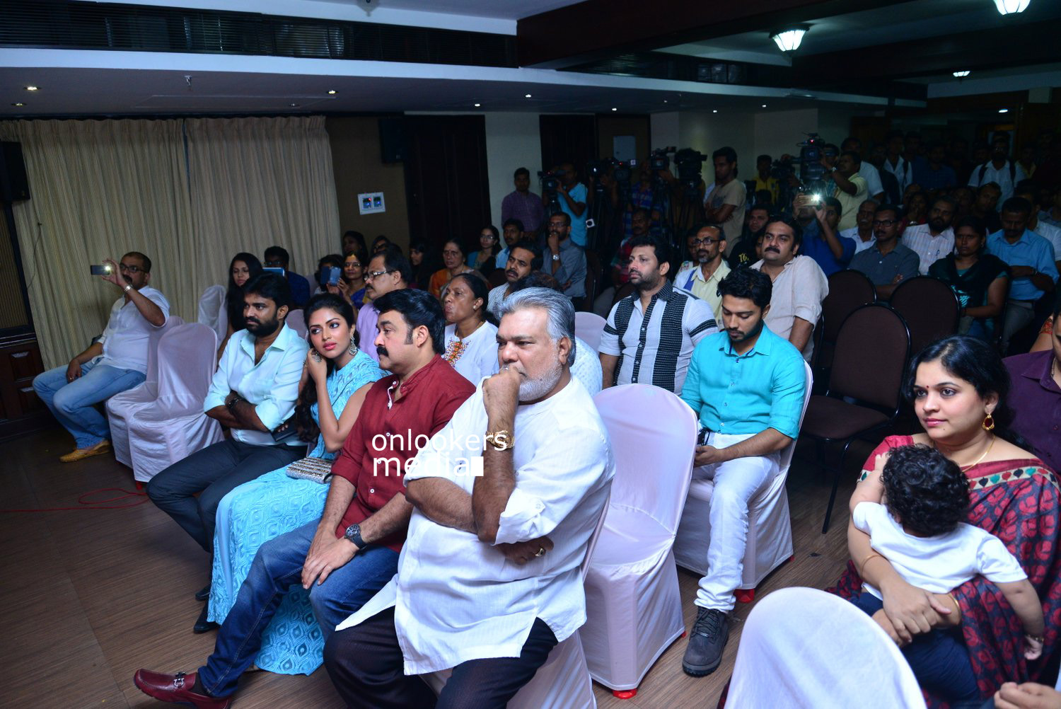https://onlookersmedia.in/wp-content/uploads/2015/04/Lalila-O-Laila-Audio-Launch-Stills-Images-Mohanlal-Amala-Paul-Malayalam-Movie-2015-Onlookers-Media-86.jpg