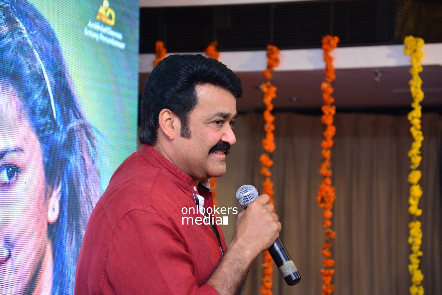 https://onlookersmedia.in/wp-content/uploads/2015/04/Mohanlal-at-Lalila-O-Laila-Audio-Launch-Stills-Images-Amala-Paul-Malayalam-Movie-2015-Onlookers-Media-11.jpg