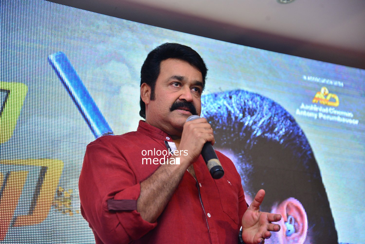 https://onlookersmedia.in/wp-content/uploads/2015/04/Mohanlal-at-Lalila-O-Laila-Audio-Launch-Stills-Images-Amala-Paul-Malayalam-Movie-2015-Onlookers-Media-12.jpg