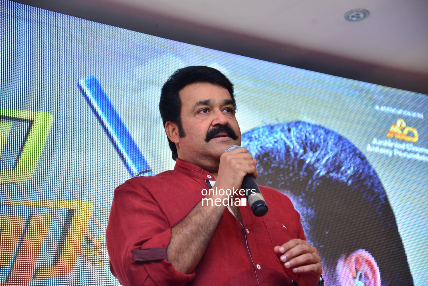 https://onlookersmedia.in/wp-content/uploads/2015/04/Mohanlal-at-Lalila-O-Laila-Audio-Launch-Stills-Images-Amala-Paul-Malayalam-Movie-2015-Onlookers-Media-13.jpg