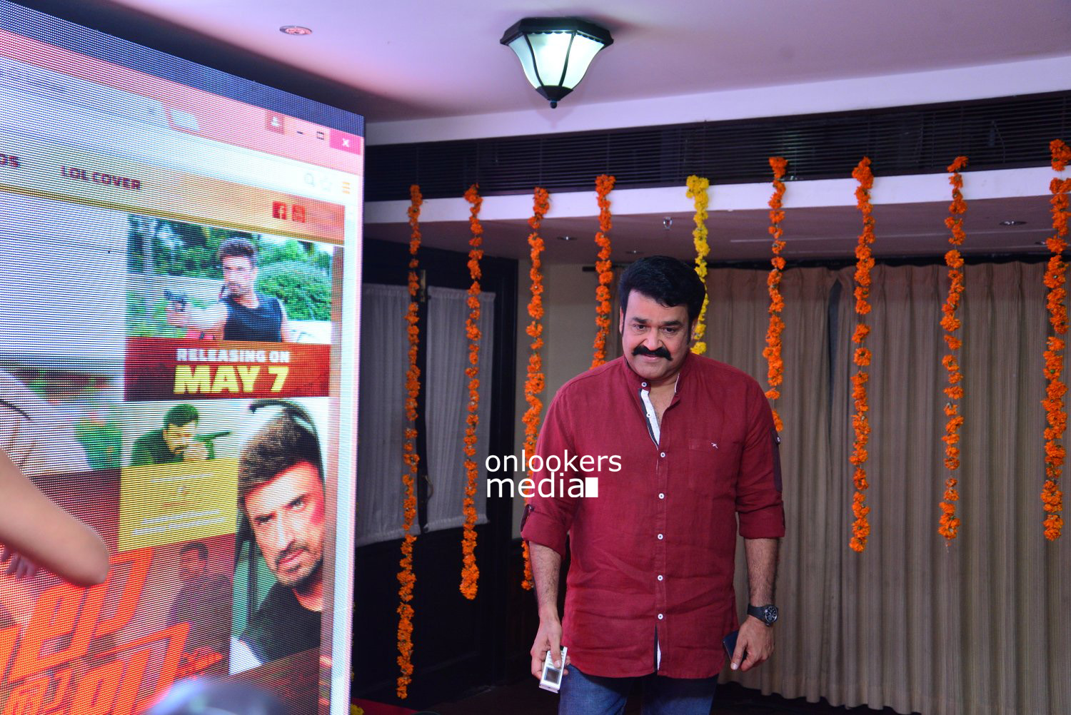 https://onlookersmedia.in/wp-content/uploads/2015/04/Mohanlal-at-Lalila-O-Laila-Audio-Launch-Stills-Images-Amala-Paul-Malayalam-Movie-2015-Onlookers-Media-2.jpg