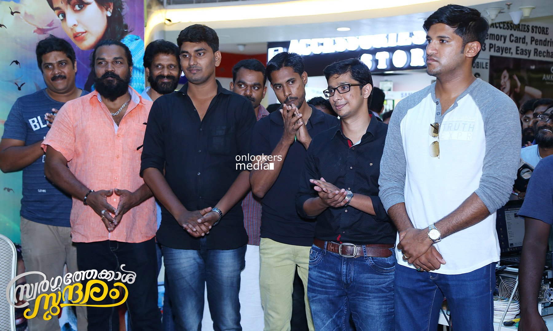 https://onlookersmedia.in/wp-content/uploads/2015/04/Swargathekkal-Sundaram-Audio-Launch-Stills-Lal-Sreenivasan-Mythili-Malayalam-Movie-2015-Onlookers-Media-15.jpg