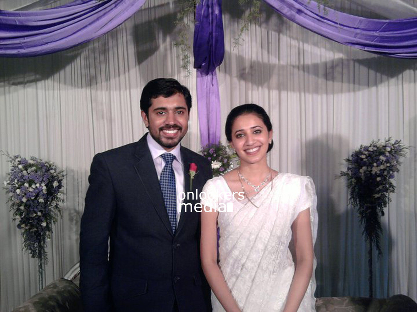 https://onlookersmedia.in/wp-content/uploads/2015/06/Nivin-Pauly-with-wife-Rinna-Joy-Nivin-Pauly-Family-Rare-Unseen-Stills-Images-Photos-Onlookers-Media-2.jpg