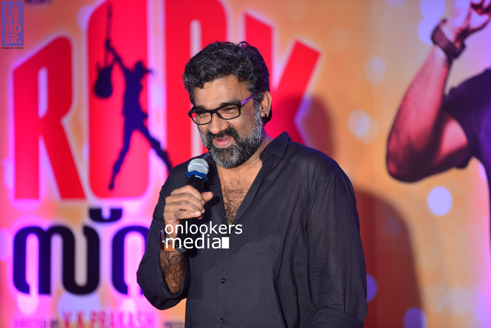 https://onlookersmedia.in/wp-content/uploads/2015/11/Director-Ranjith-at-Rockstar-Audio-Launch-Stills-Photos-3.jpg