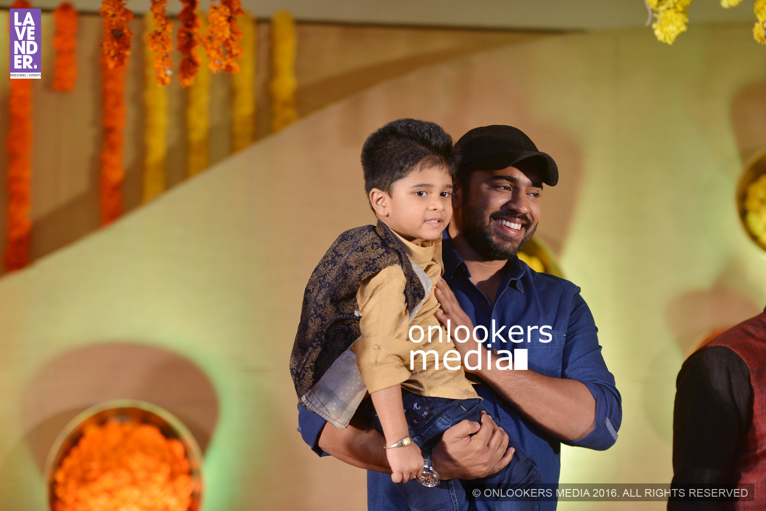 http://onlookersmedia.in/wp-content/uploads/2016/02/Nivin-Pauly-at-Vijayaraghavan-son-wedding-reception-stills-photos-10.jpg