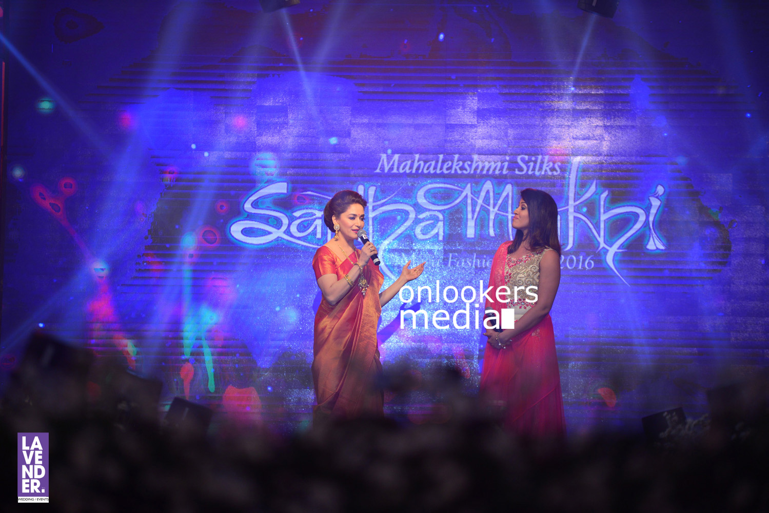 http://onlookersmedia.in/wp-content/uploads/2016/07/Madhuri-Dixit-at-Saptamukhi-2016-Mahalekshmi-Silks-fashion-show-21.jpg